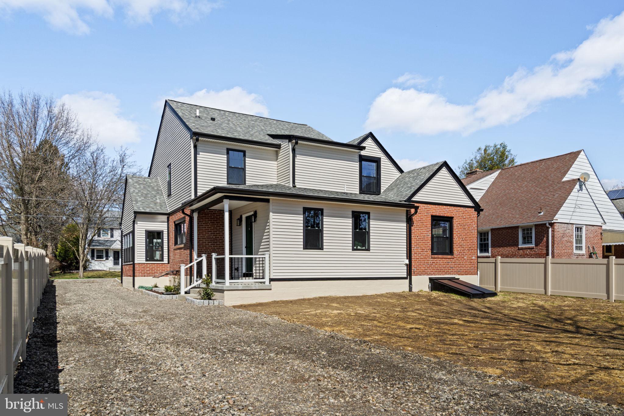 1439 Dorchester Road Havertown, PA 19083 - Photo 56 of 60 a front view of a house with a yard