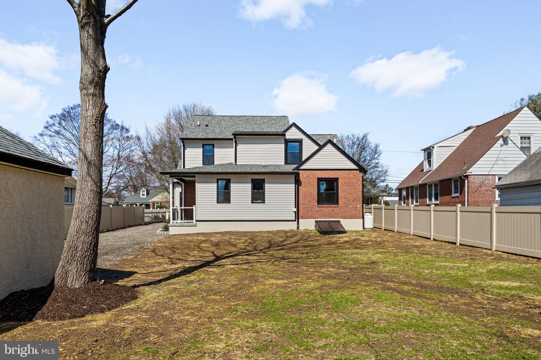 1439 Dorchester Road Havertown, PA 19083 - Photo 57 of 60 a house that has a tree in front of it