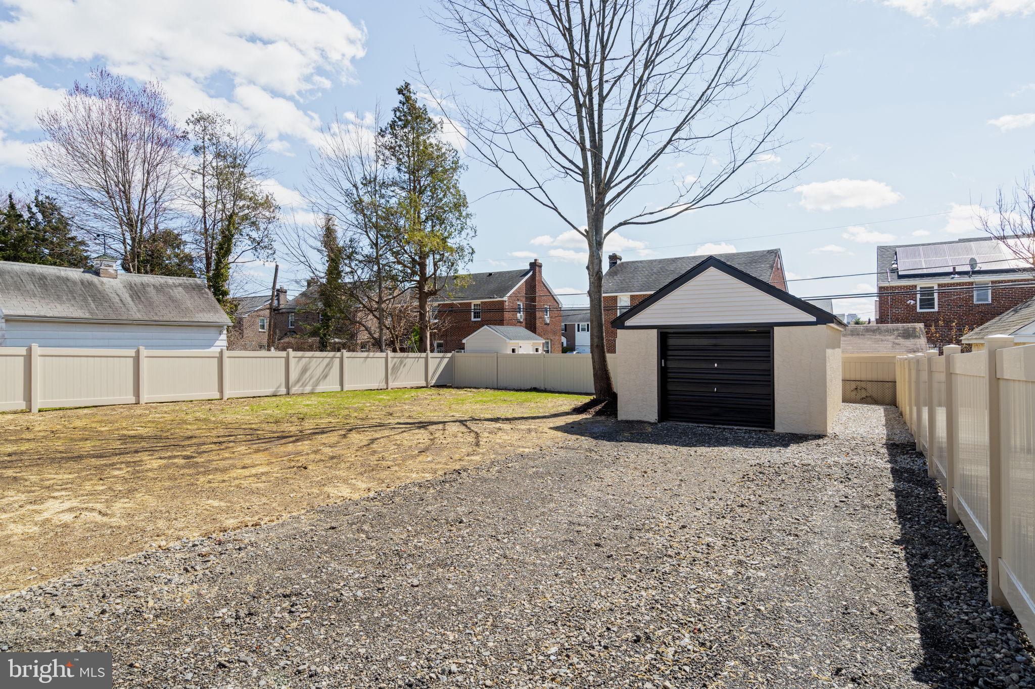 1439 Dorchester Road Havertown, PA 19083 - Photo 59 of 60 a house with yard covered with trees
