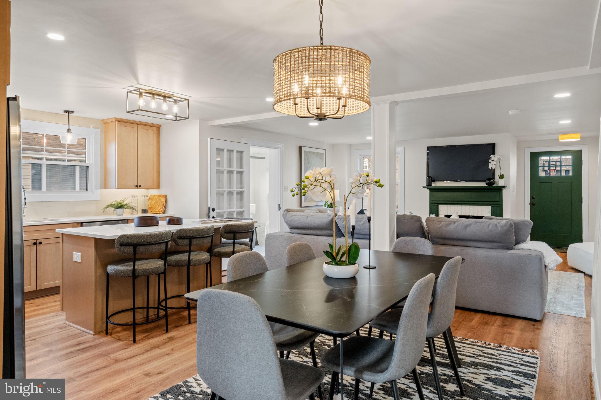 1439 Dorchester Road Havertown, PA 19083 - Photo 8 of 60 a view of a dining room with furniture a chandelier and wooden floor