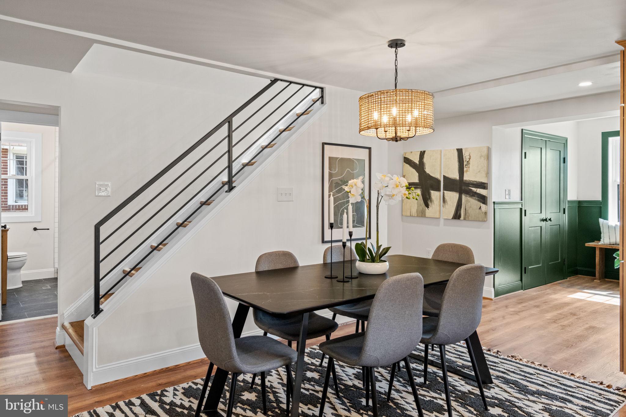 1439 Dorchester Road Havertown, PA 19083 - Photo 9 of 60 a view of a dining room with furniture and a chandelier