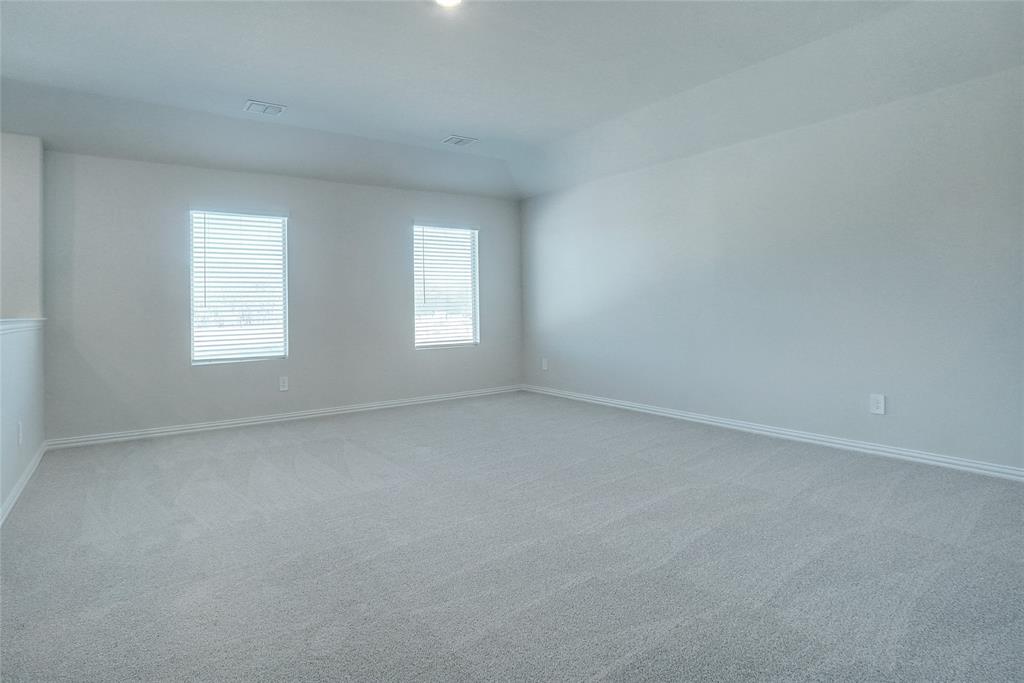 1008 Eagle Run Lane Lavon, TX 75166 - Photo 10 of 16 an empty room with windows