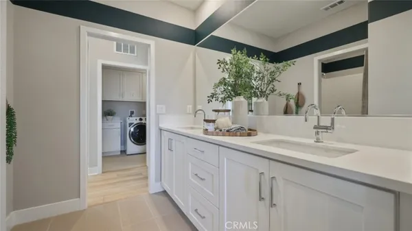 a bathroom with a toilet and a bathtub