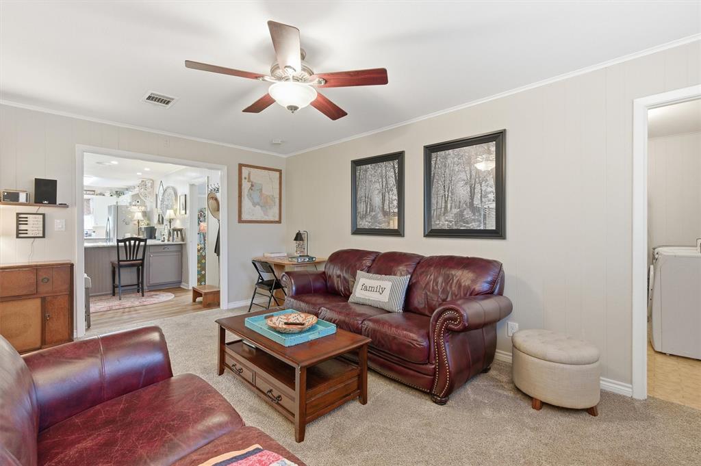 515 Pecan Street Collinsville, TX 76233 - Photo 27 of 39 a living room with furniture and windows