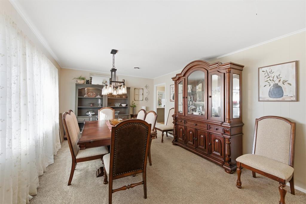 515 Pecan Street Collinsville, TX 76233 - Photo 7 of 39 a view of a livingroom with furniture and a window