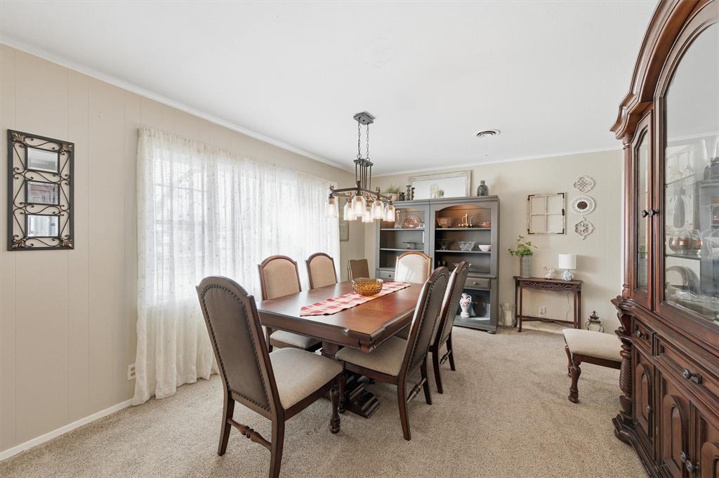 515 Pecan Street Collinsville, TX 76233 - Photo 8 of 39 a dining room with furniture and window
