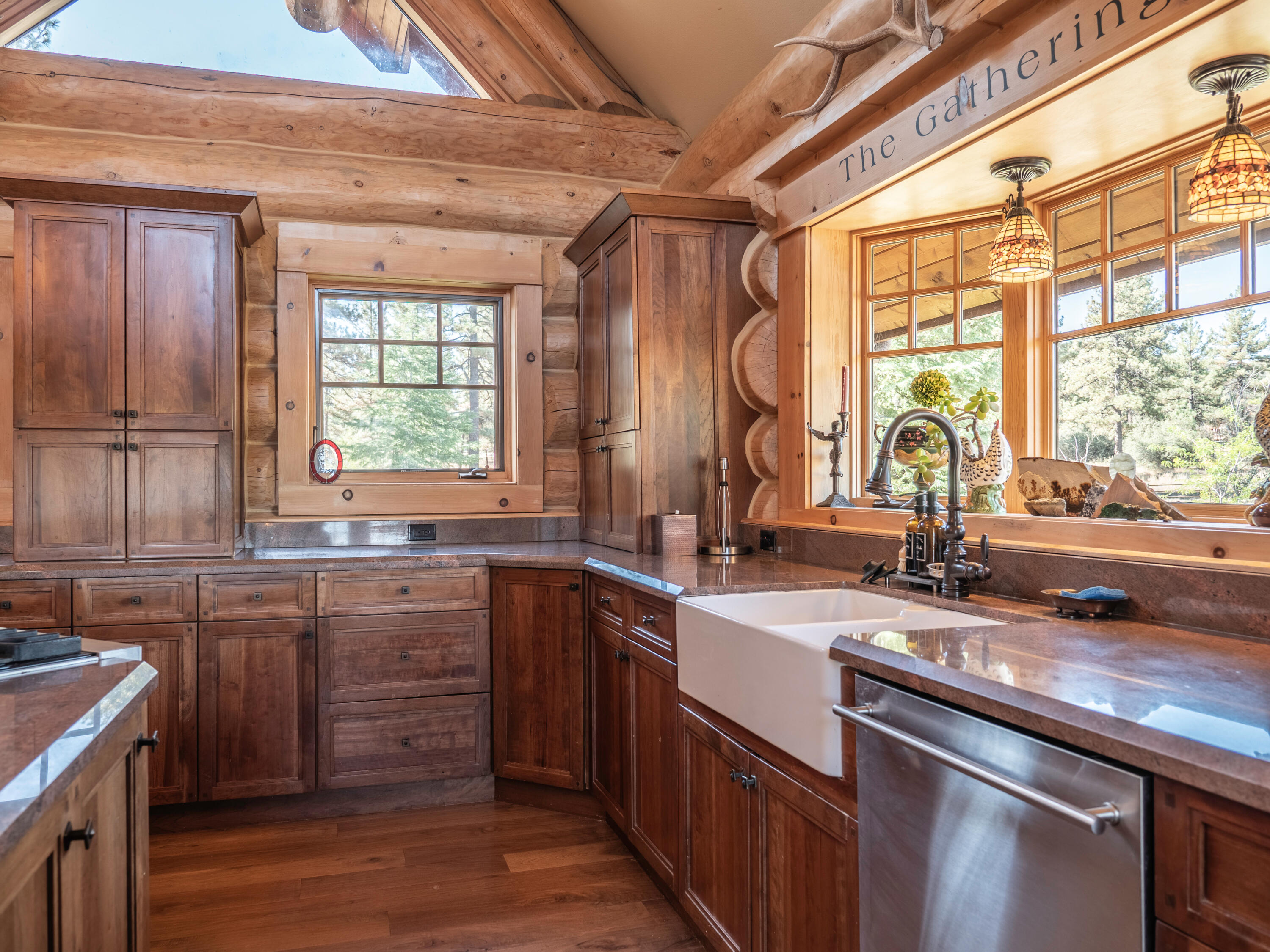 61072 Devils Ladder Road Mountain Center, CA 92561 - Photo 11 of 81 a kitchen with a sink stove and cabinets