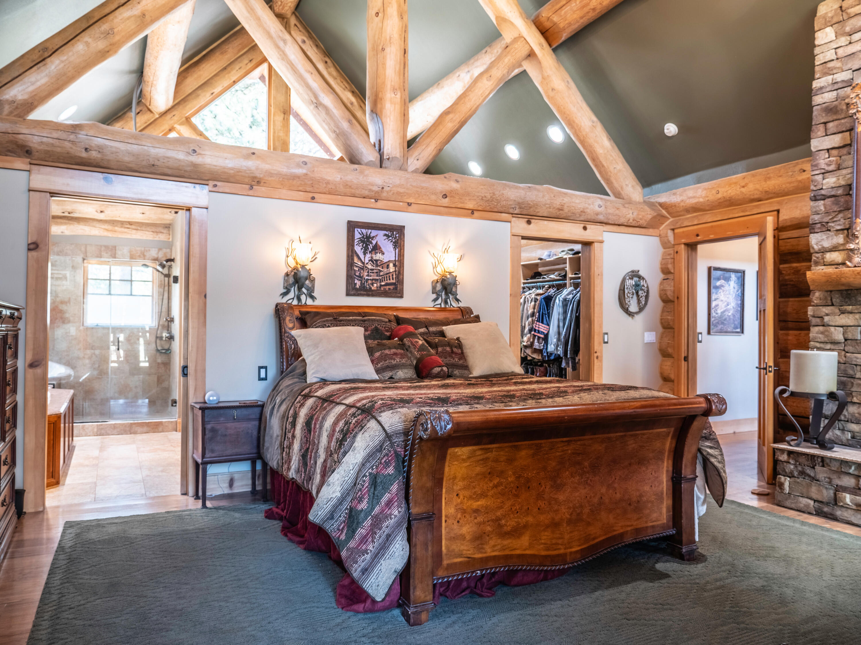 61072 Devils Ladder Road Mountain Center, CA 92561 - Photo 16 of 81 a bed room with a bed and a large mirror