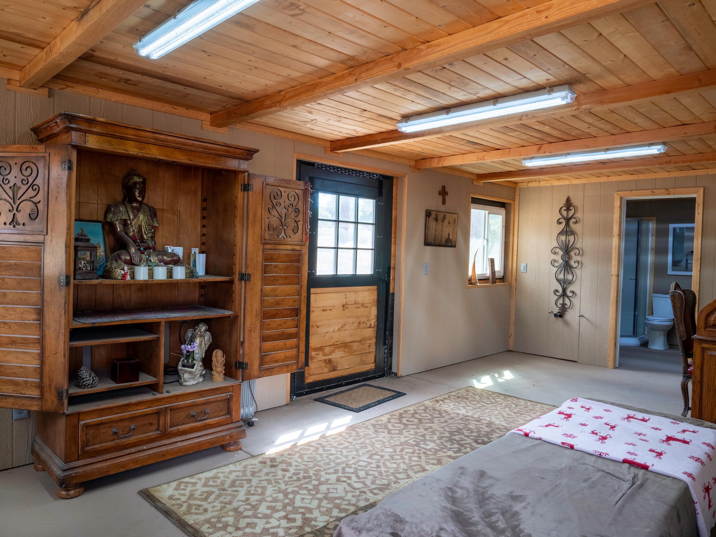 61072 Devils Ladder Road Mountain Center, CA 92561 - Photo 40 of 81 a bedroom with furniture and baby crib