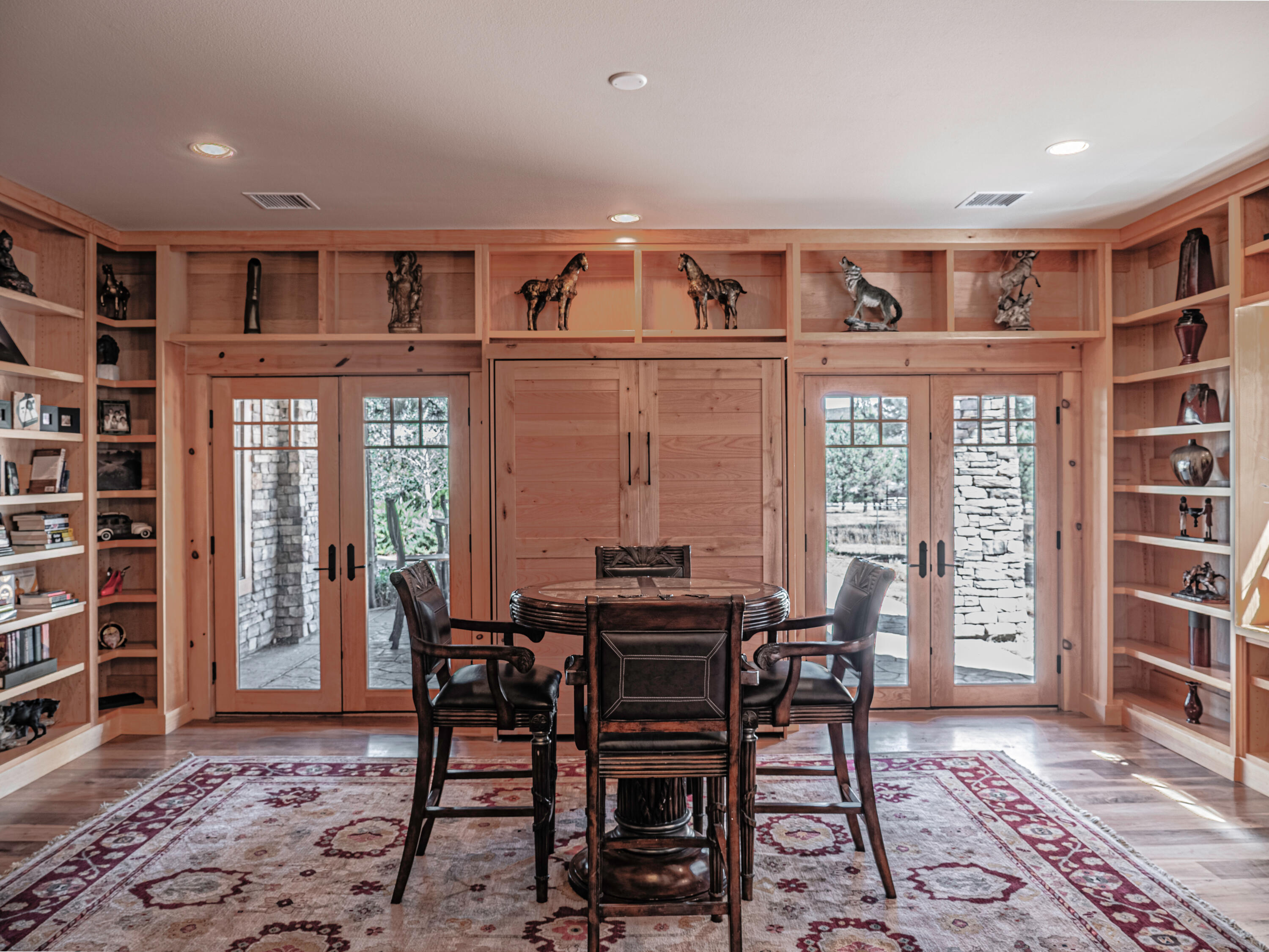 61072 Devils Ladder Road Mountain Center, CA 92561 - Photo 50 of 81 a view of a dining room with furniture window and wooden floor