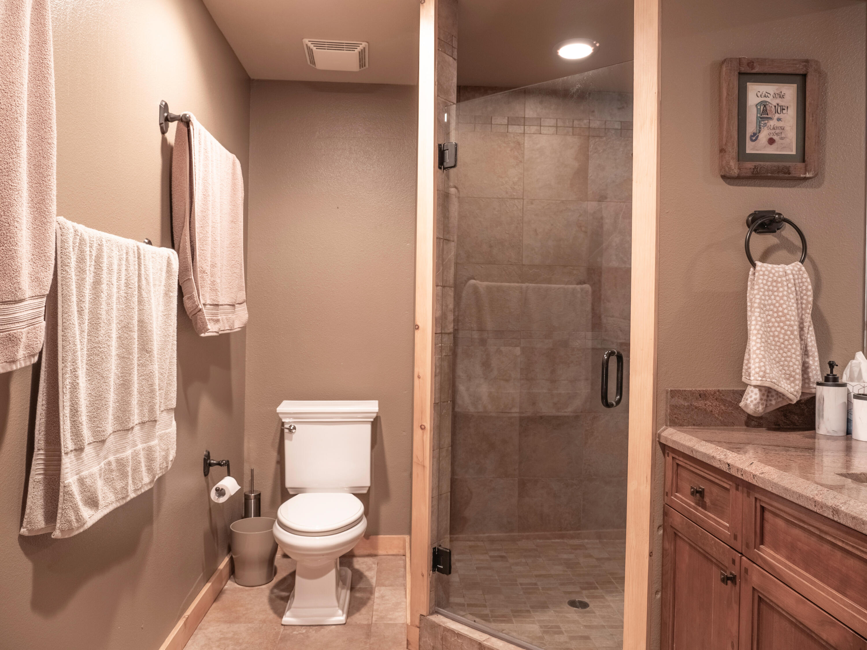 61072 Devils Ladder Road Mountain Center, CA 92561 - Photo 51 of 81 a bathroom with a toilet a sink and shower