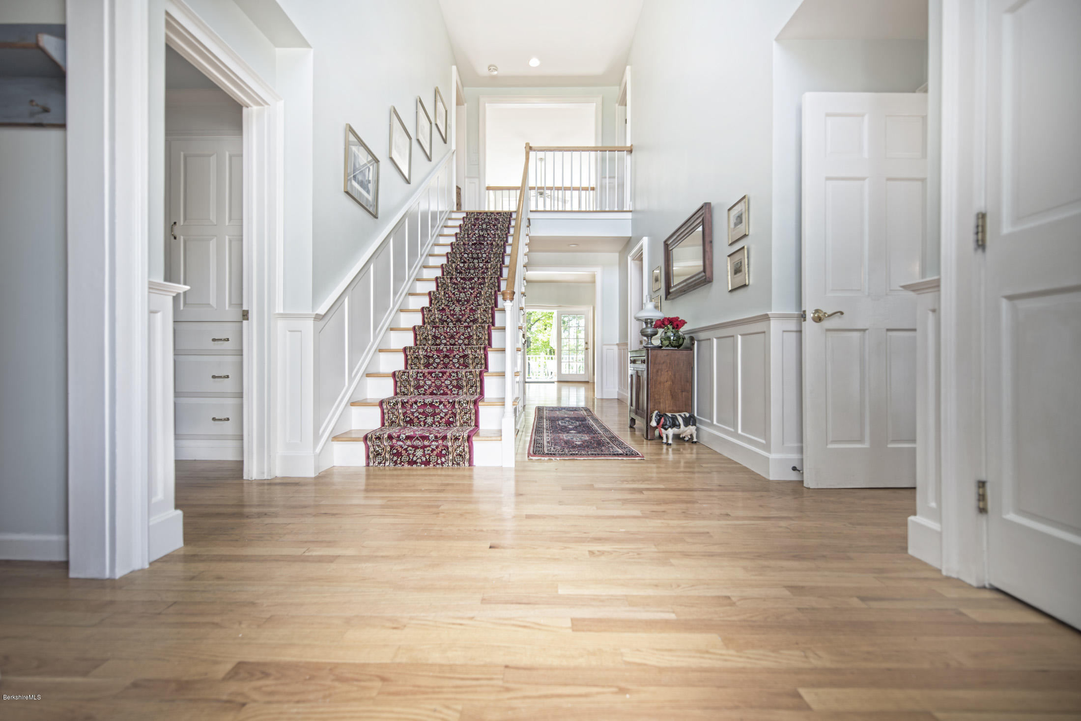 1136 Barker Road, Unit 36 Pittsfield, MA 01201 - Photo 2 of 28 a view of entryway and hall with wooden floor