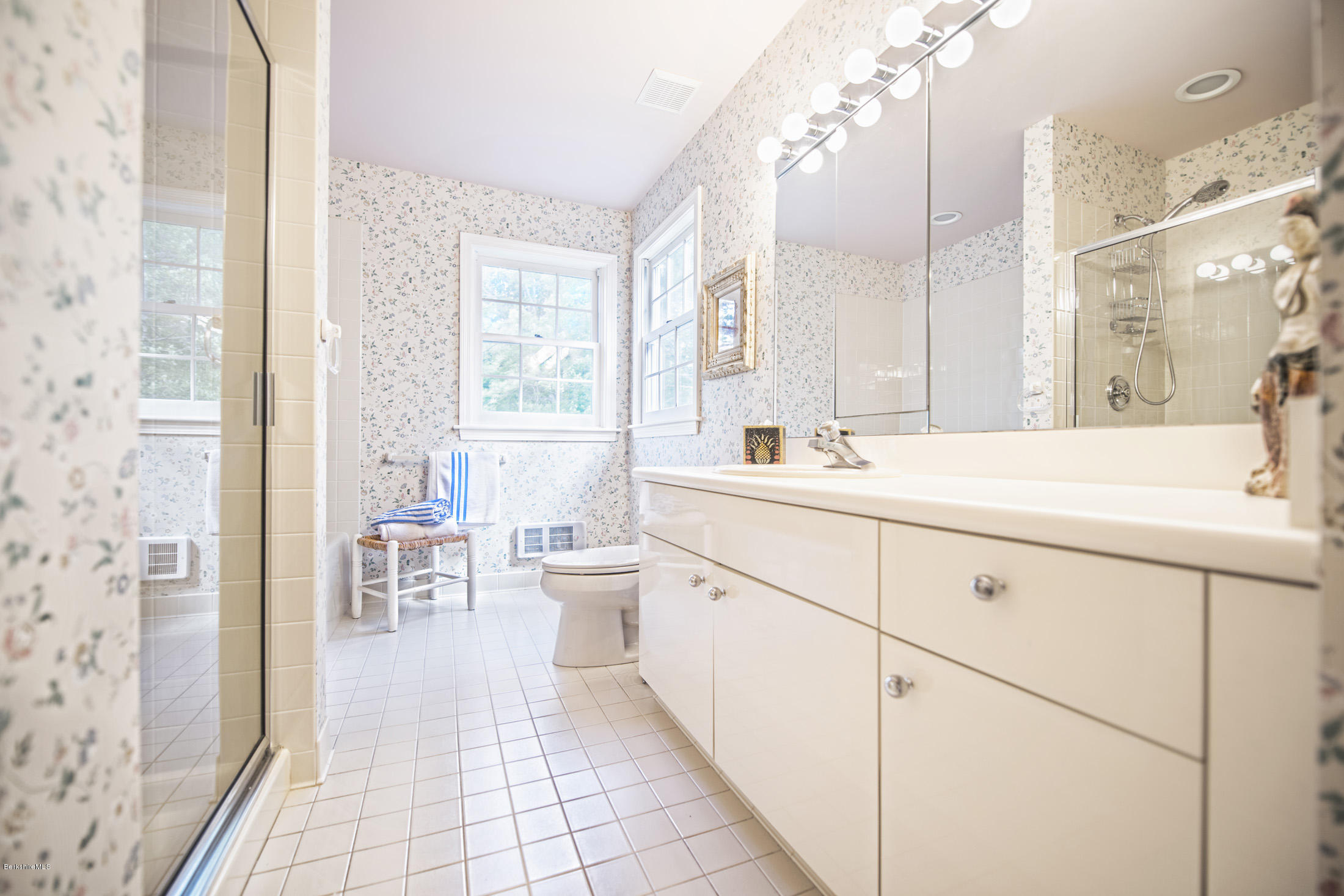 1136 Barker Road, Unit 36 Pittsfield, MA 01201 - Photo 16 of 28 a spacious bathroom with a double vanity sink mirror and a bathtub