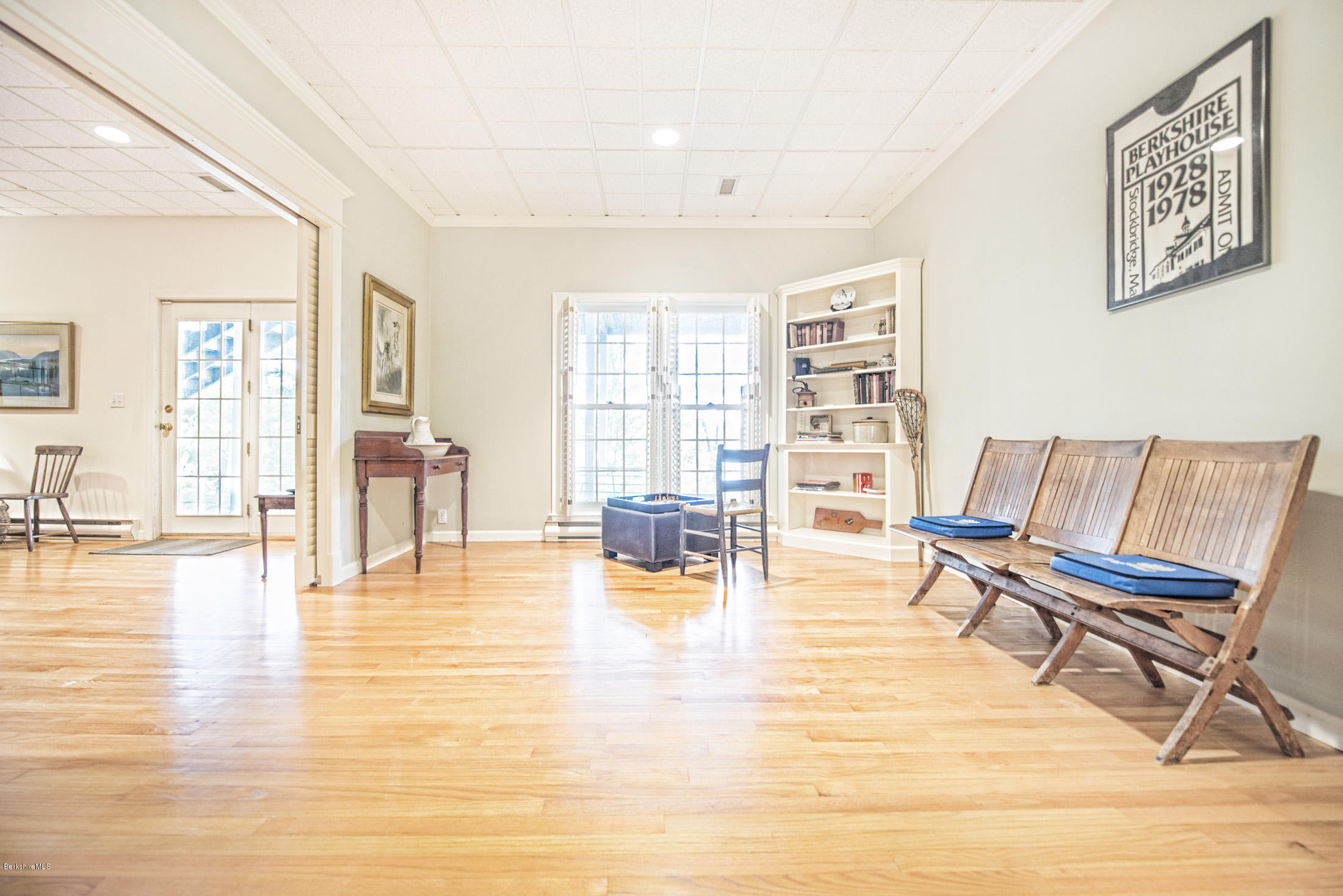1136 Barker Road, Unit 36 Pittsfield, MA 01201 - Photo 18 of 28 a living room with furniture and wooden floor