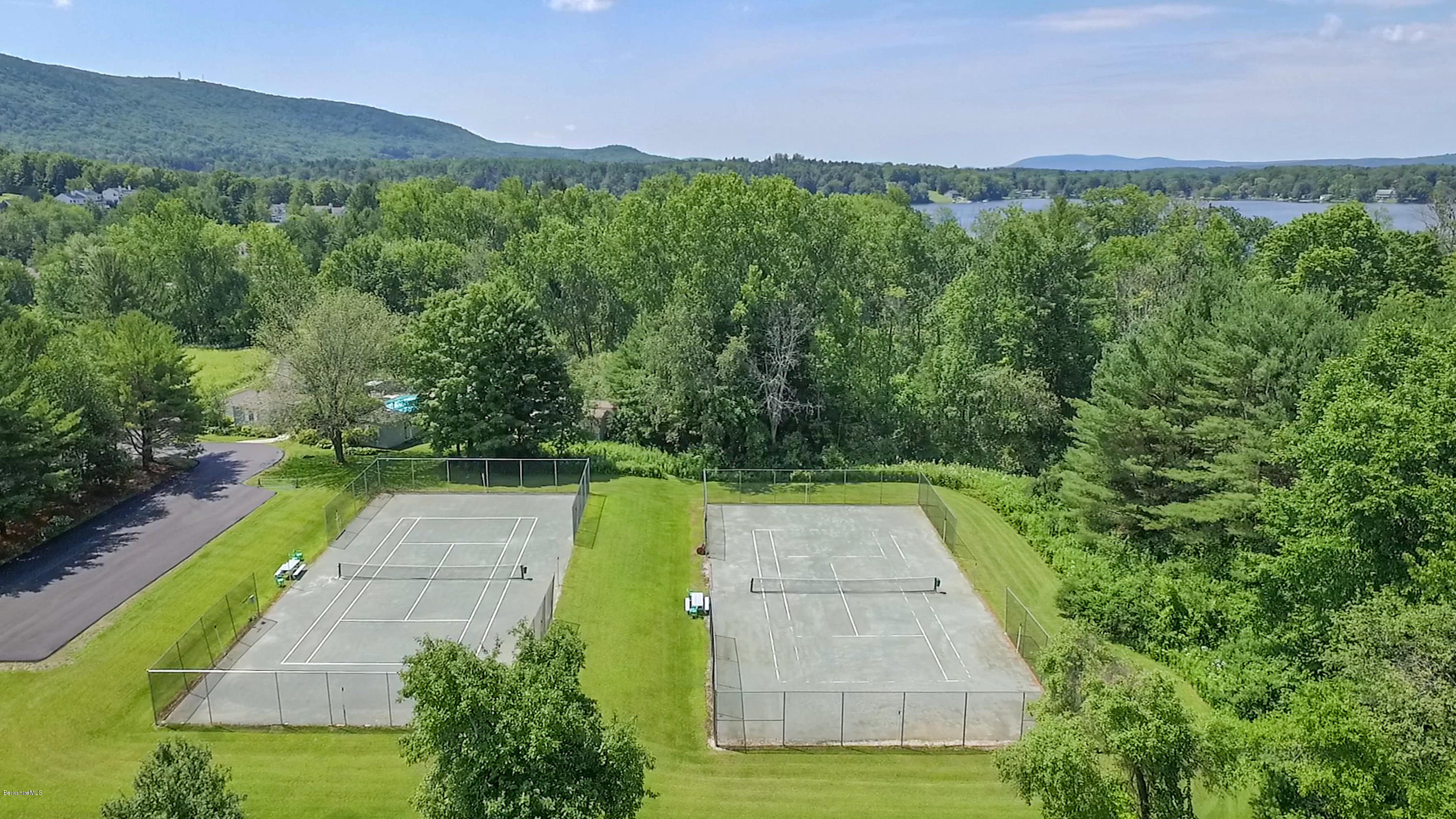 1136 Barker Road, Unit 36 Pittsfield, MA 01201 - Photo 25 of 28 a view of an outdoor space with a swimming pool