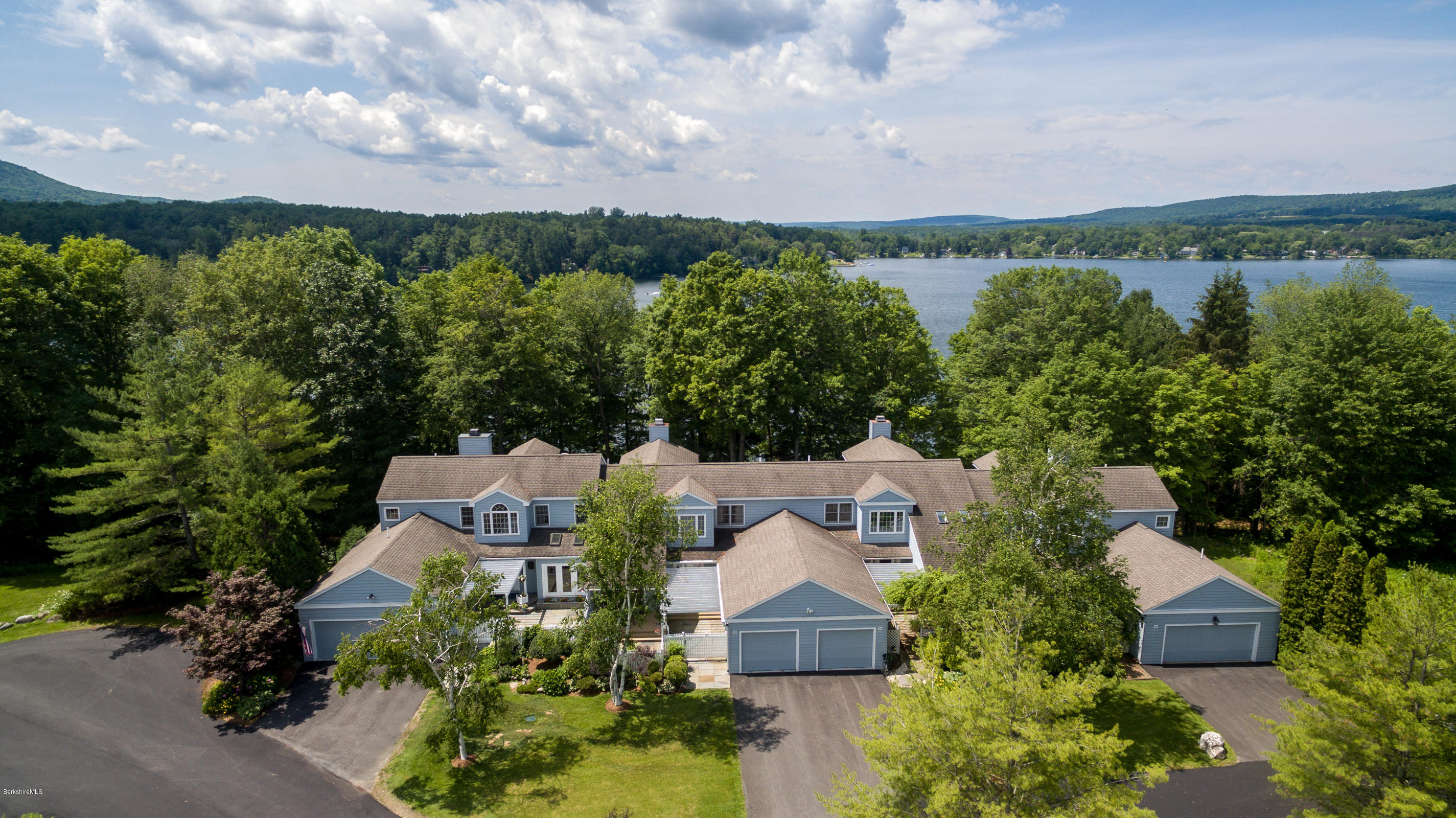 1136 Barker Road, Unit 36 Pittsfield, MA 01201 - Photo 27 of 28 an aerial view of a house with lots of trees
