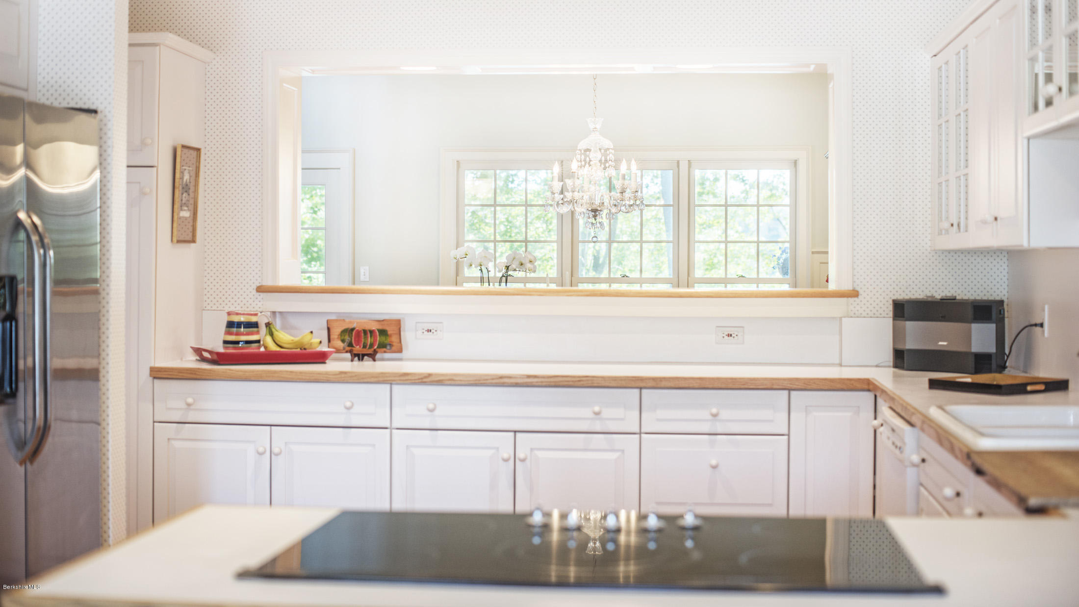 1136 Barker Road, Unit 36 Pittsfield, MA 01201 - Photo 6 of 28 a kitchen with a sink cabinets and window
