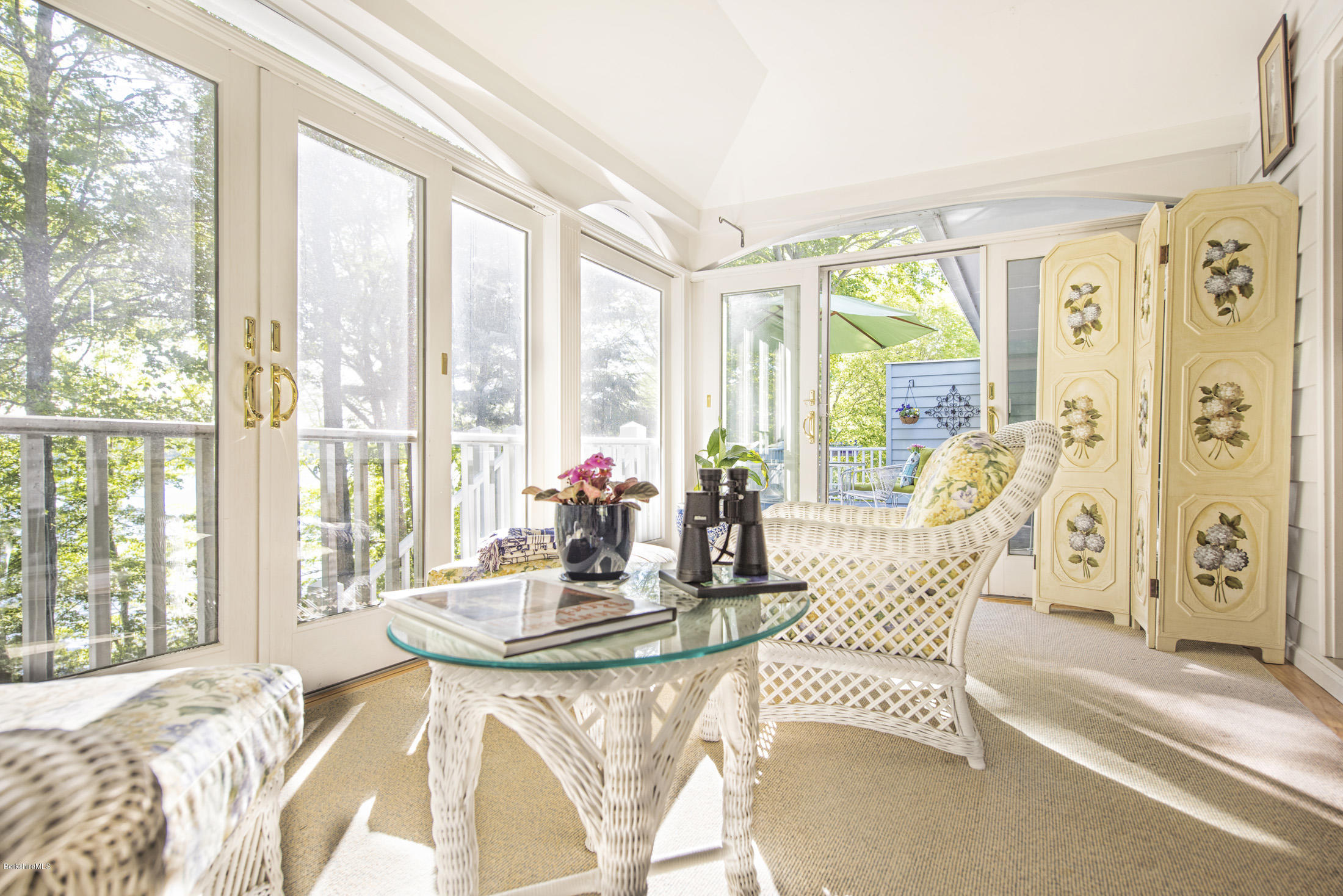 1136 Barker Road, Unit 36 Pittsfield, MA 01201 - Photo 9 of 28 a view of a dining room with furniture and a large window