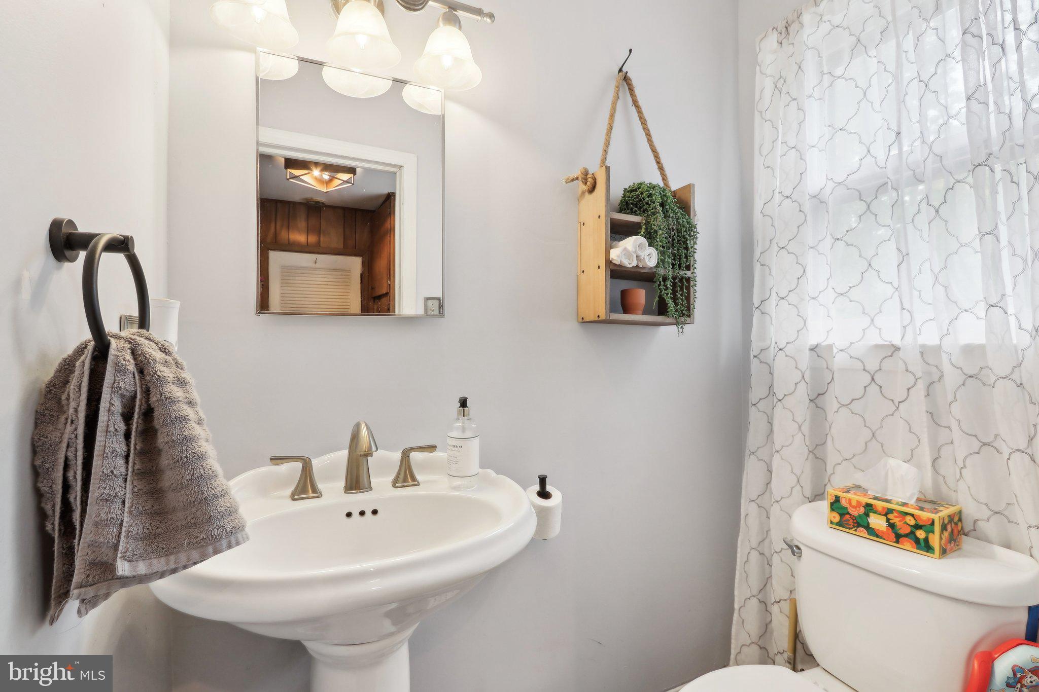 595 Tabernacle Road Medford, NJ 08055 - Photo 33 of 65 a bathroom with a sink mirror and toilet