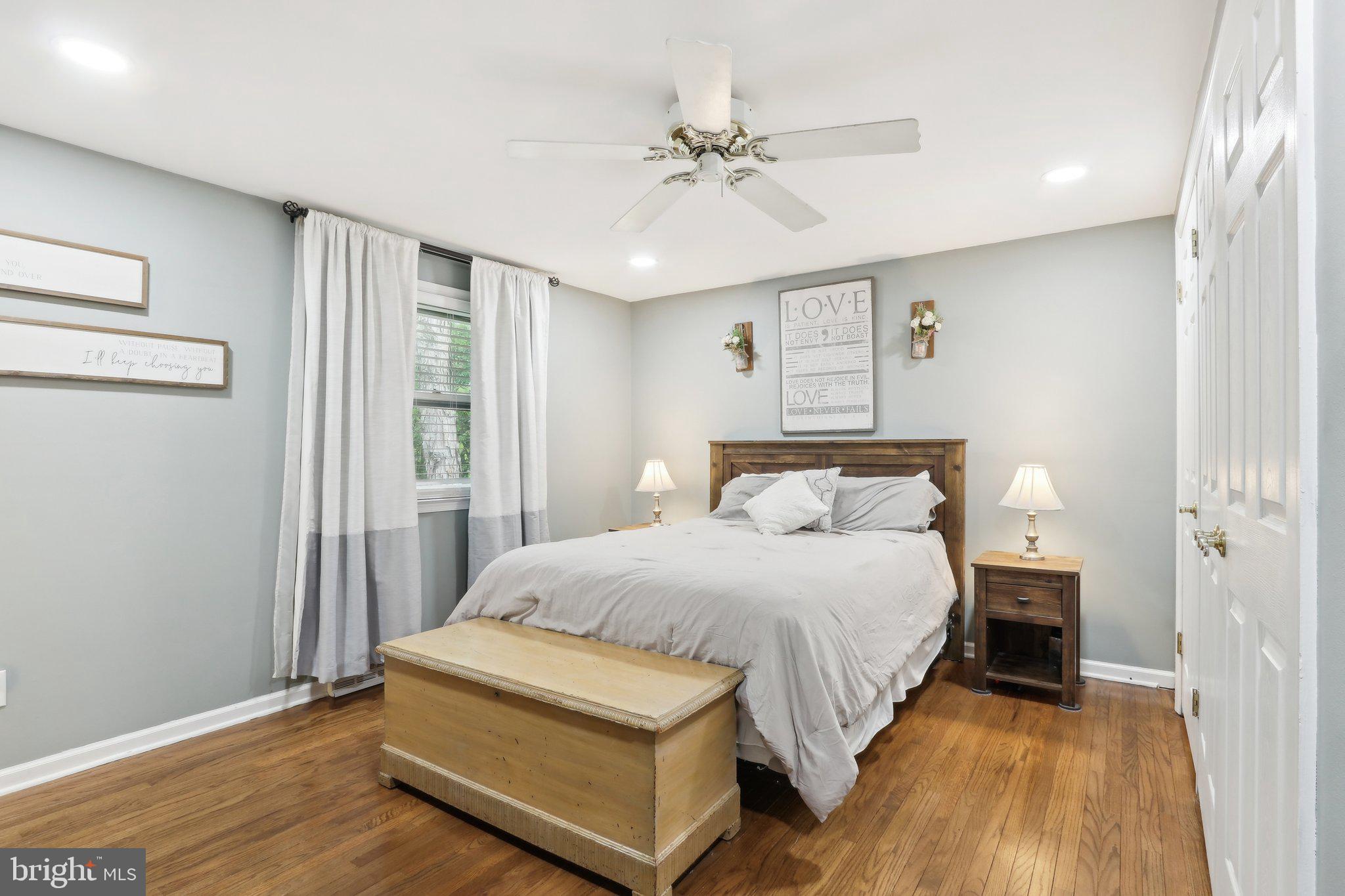 595 Tabernacle Road Medford, NJ 08055 - Photo 36 of 65 a bedroom with a bed and a ceiling fan