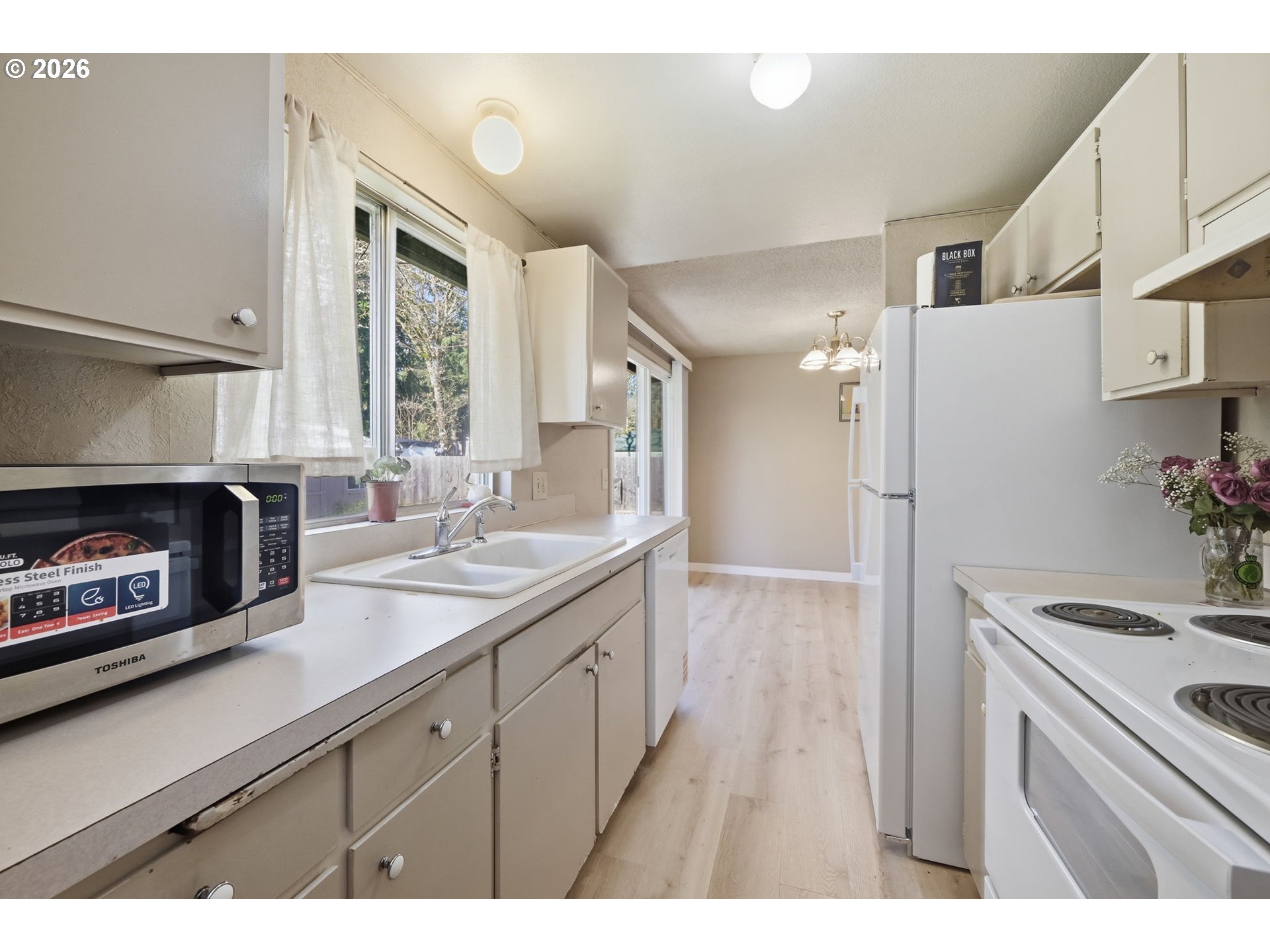 87988 6th Street Veneta, OR 97487 - Photo 11 of 20 a kitchen with a refrigerator and a sink