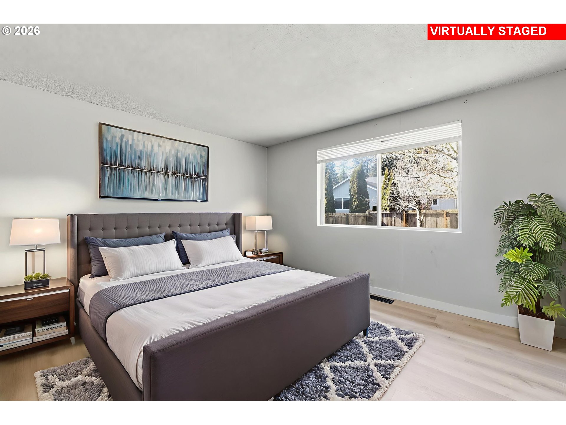 87988 6th Street Veneta, OR 97487 - Photo 15 of 20 a bedroom with a bed and a painting on the wall