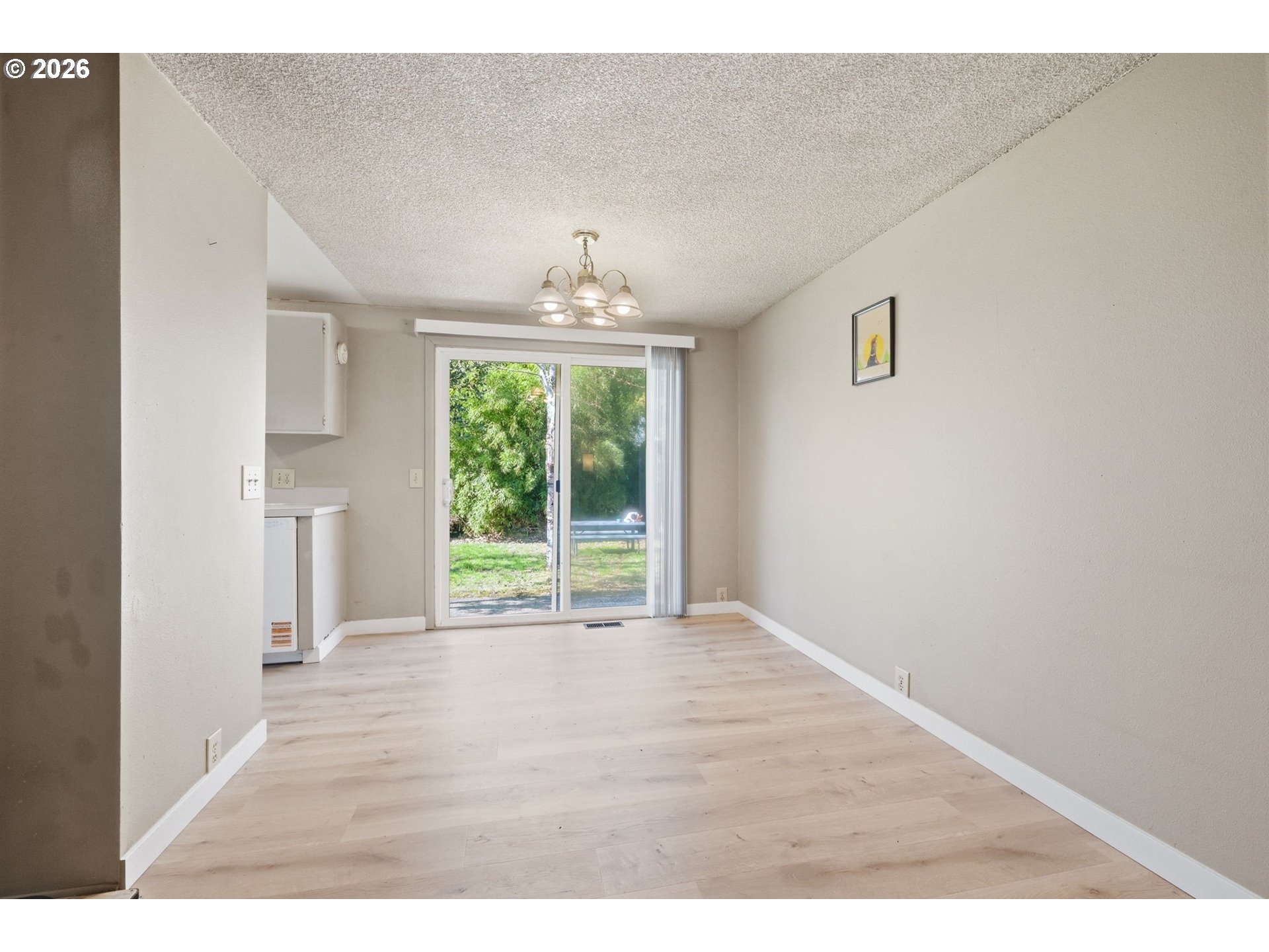 87988 6th Street Veneta, OR 97487 - Photo 6 of 20 a view of an empty room with a window