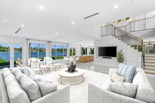 a room with stairs and a fireplace