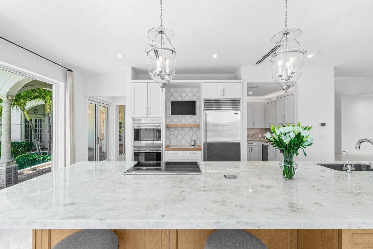 1690 Lands End Road Manalapan, FL 33462 - Photo 17 of 59 a view of a living room and kitchen