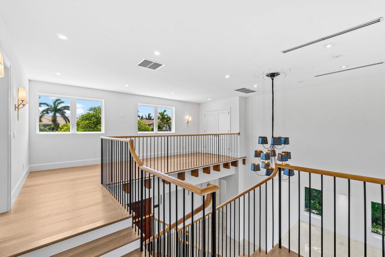 1690 Lands End Road Manalapan, FL 33462 - Photo 24 of 59 a view of a hallway