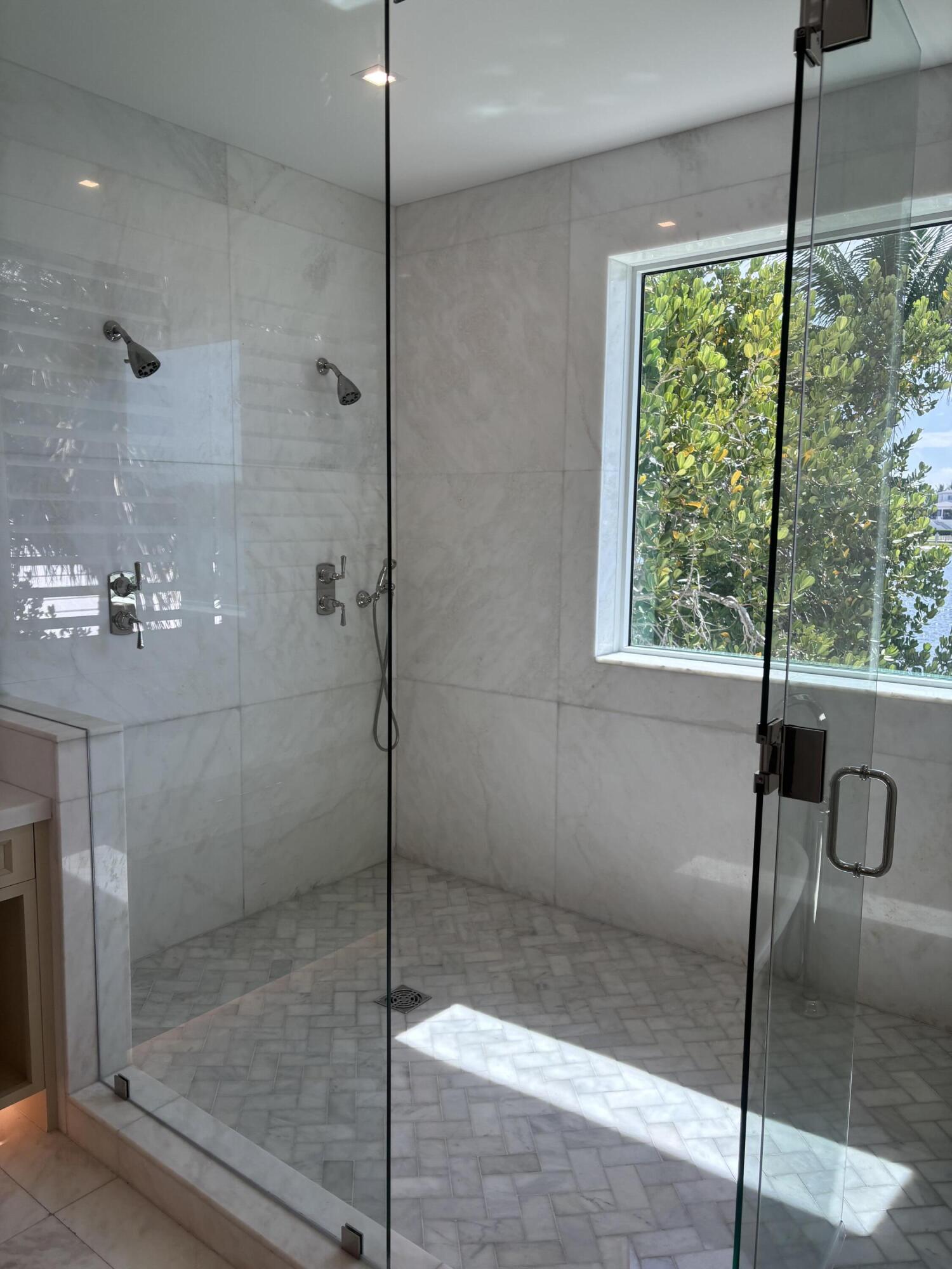 1690 Lands End Road Manalapan, FL 33462 - Photo 33 of 59 a bathroom with a shower