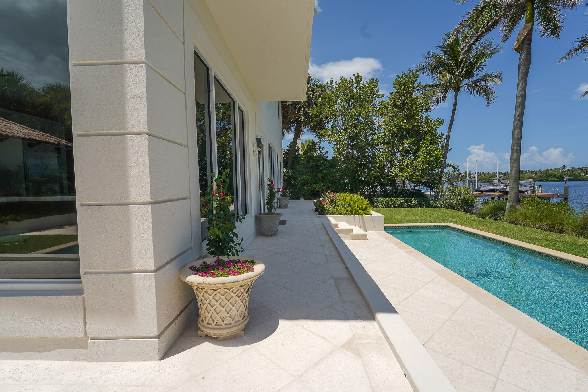 1690 Lands End Road Manalapan, FL 33462 - Photo 51 of 59 a view of swimming pool with a lounge chairs