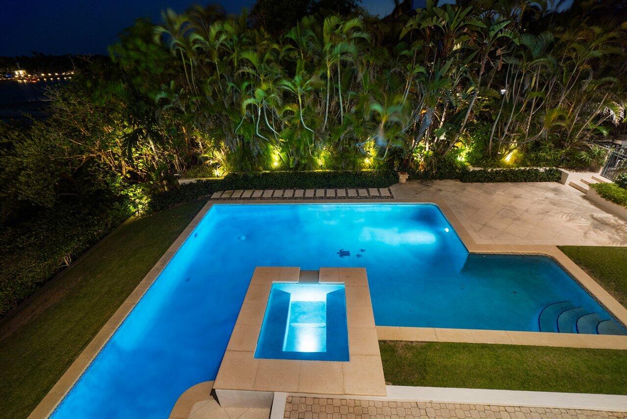 1690 Lands End Road Manalapan, FL 33462 - Photo 53 of 59 a view of swimming pool with a yard