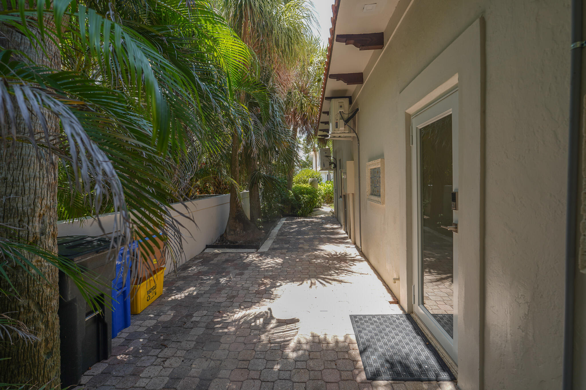 1690 Lands End Road Manalapan, FL 33462 - Photo 59 of 59 a view of a pathway of a building