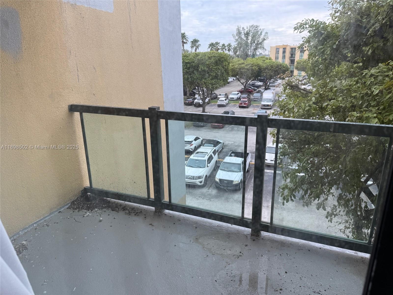 11780 Southwest 18th Street, Unit 4182 Miami, FL 33175 - Photo 2 of 14 a view of a glass door and a window