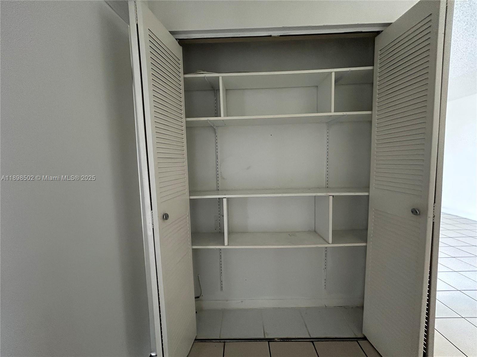 11780 Southwest 18th Street, Unit 4182 Miami, FL 33175 - Photo 7 of 14 a close up view of a closet