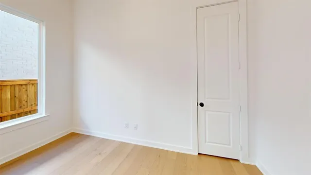 a view of an empty room with window