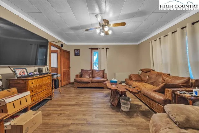 a bathroom with a sink a mirror and a shower