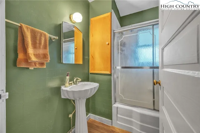 a view of a mountain with mountains in the background