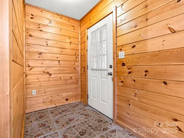 a view of a kitchen with granite countertop cabinets and a wooden floor