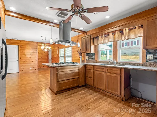a bathroom with a sink a vanity and a mirror