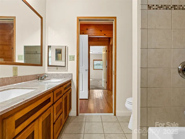 a view of a two chairs in front of a door