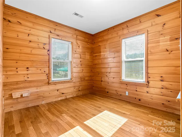 a view of outdoor space and wooden floor