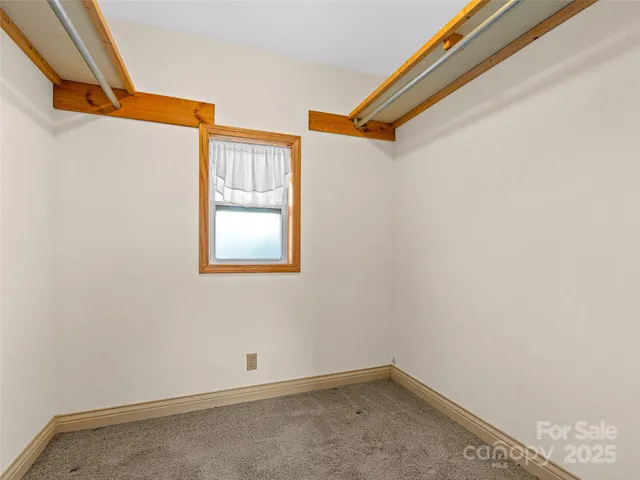 a view of a hallway with window