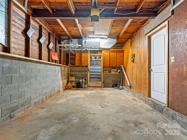 a view of a house with a wooden fence