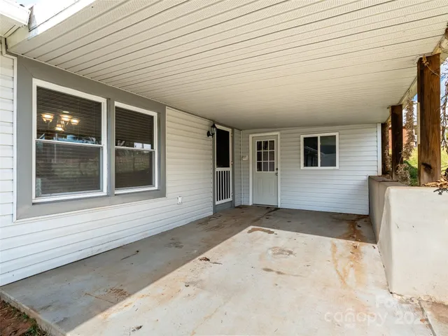 a bathroom with a sink and a large window