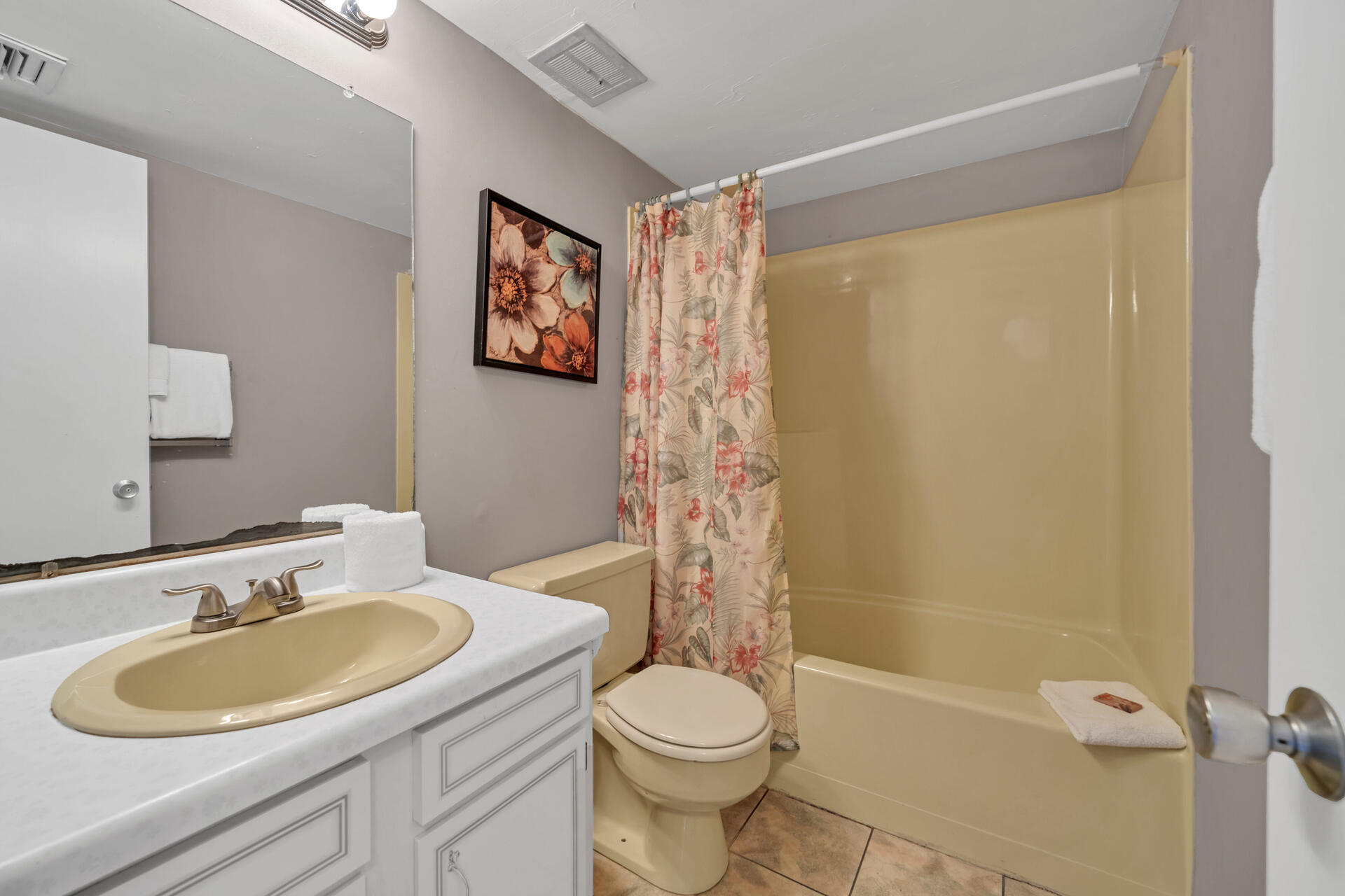 909 Santa Rosa Boulevard, Unit 138 Fort Walton Beach, FL 32548 - Photo 21 of 27 a bathroom with a sink toilet and shower