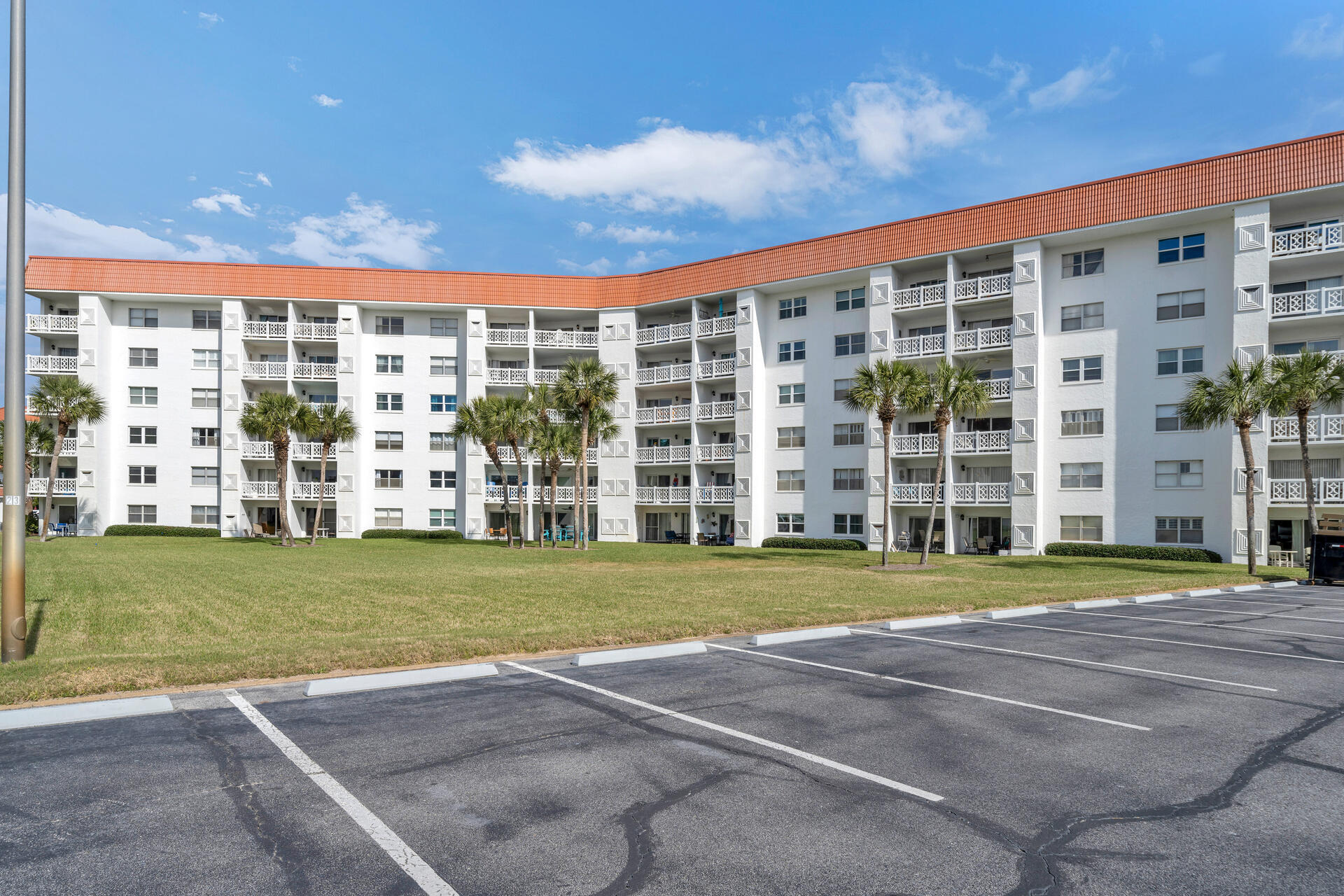 909 Santa Rosa Boulevard, Unit 138 Fort Walton Beach, FL 32548 - Photo 24 of 27 a front view of a building with a play ground