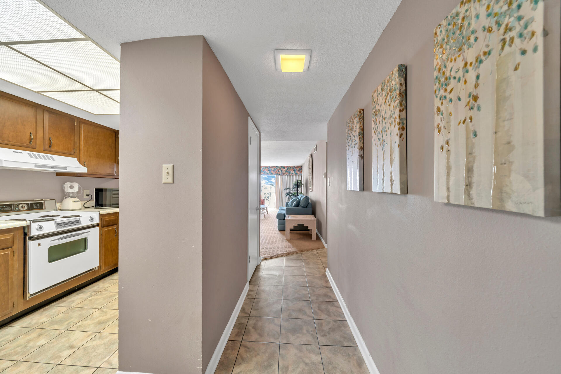 909 Santa Rosa Boulevard, Unit 138 Fort Walton Beach, FL 32548 - Photo 5 of 27 a view of a kitchen from the hallway