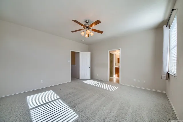 a bathroom with a bathtub and a sink